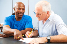 man teaching senior